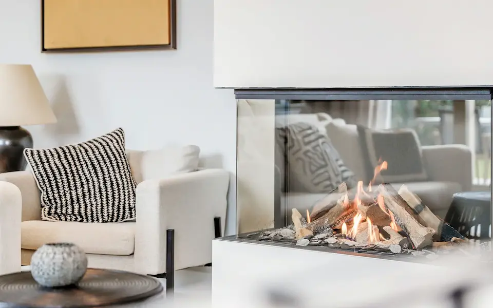 Silicon Valley property real estate agents Living room with wood fireplace.