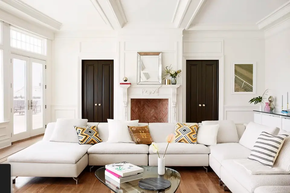 Silicon Valley property real estate agents Luxury living room with large sofa chaise lounge.